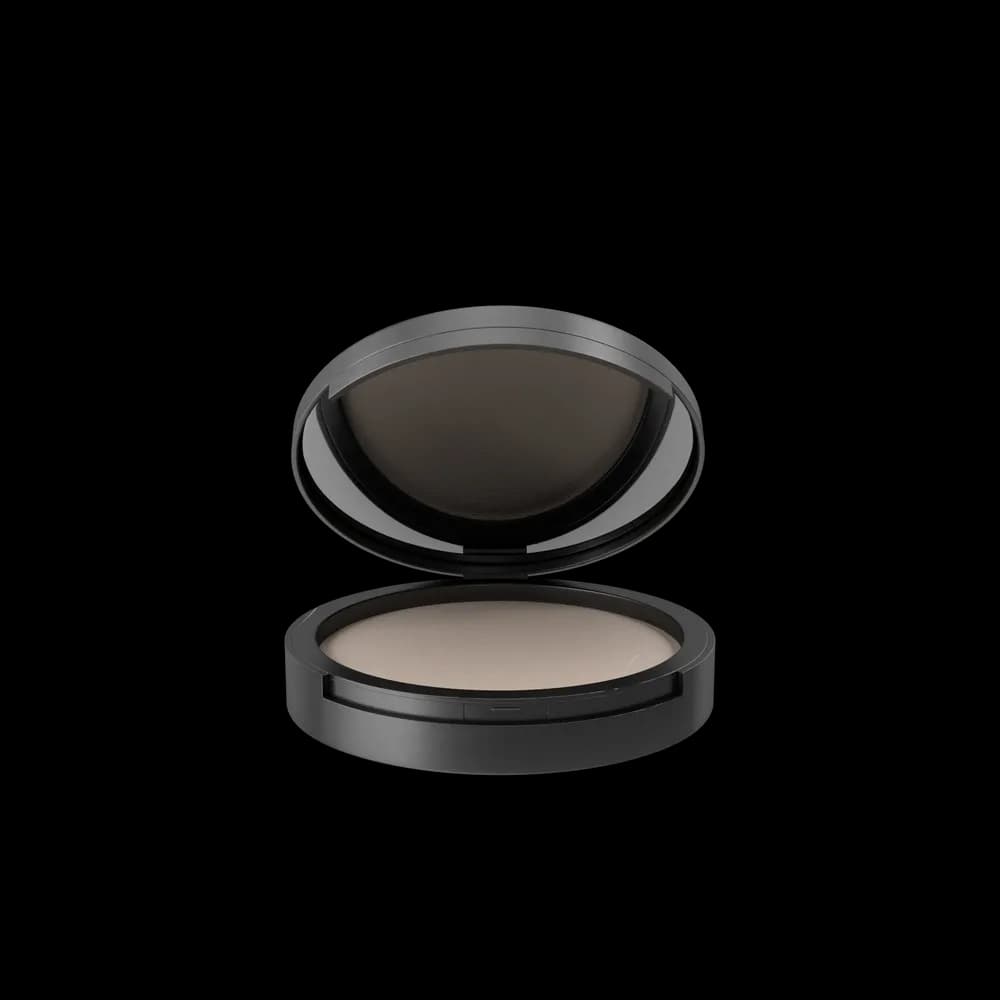 The Powder Canister is a finely milled setting powder designed to set makeup and control shine. With a lightweight and translucent formula, it provides a smooth and matte finish.
