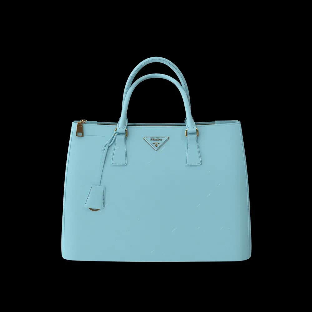 The Prada Women Bag is an iconic designer bag that exudes elegance and luxury. Crafted with precision and featuring the Prada logo, it's a statement piece for fashion enthusiasts.